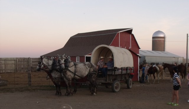 Cowboy style shuttle service form the alfalfa field parking lot at J Heart Ranch Days, Waubay, South Dakota