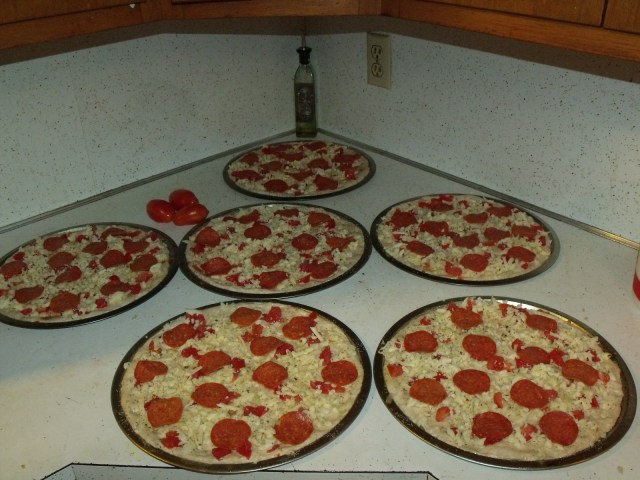 Pizza to be frozen raw.