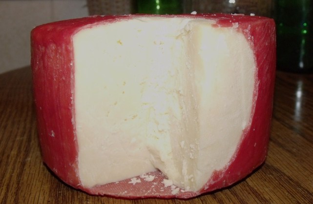 One of my homemade cheddar cheeses.