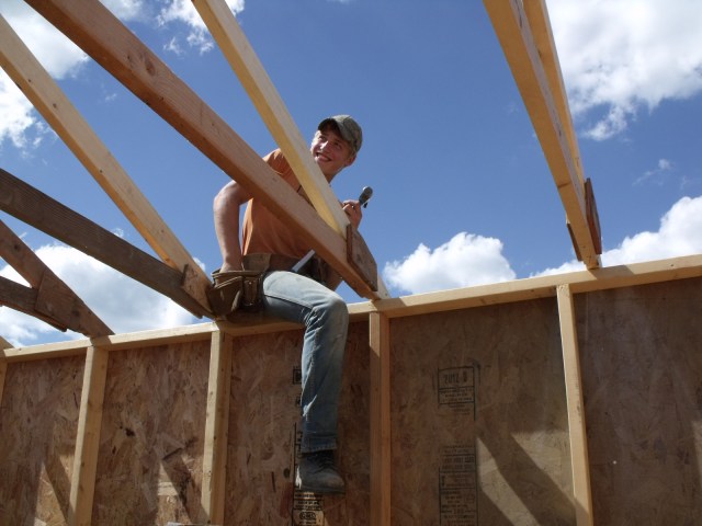 Caleb working on our new chicken house.