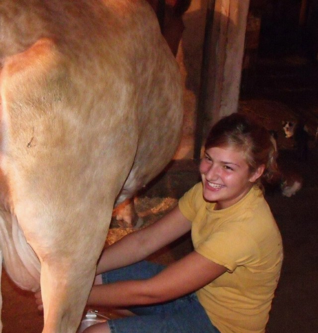 Maggie milking Brindle