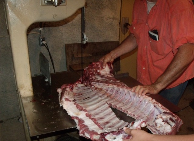 Fred cut into the ribs very easily while Maggie worked the other end. Slick!