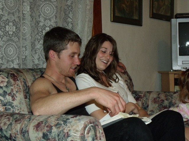 Luke and Jessi singing Christmas carols.