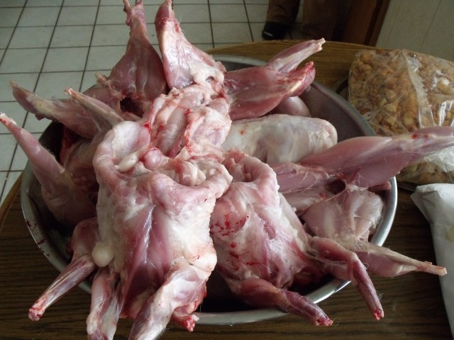 Fresh rabbit meat ready to be washed and bagged.