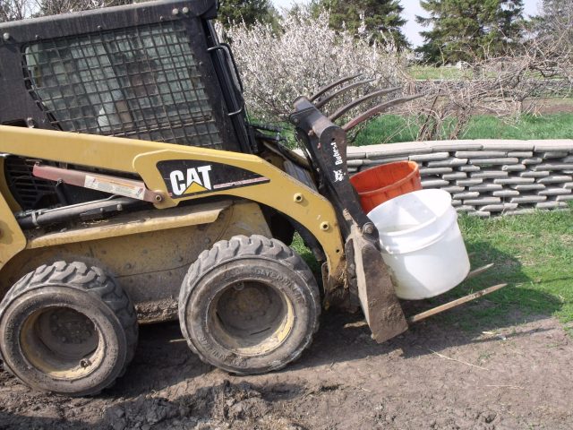 Magdalene hauling water in.  Fred asked me last night why we didn't just turn on the irrigation:)  My answer:  we only needed to water transplants!