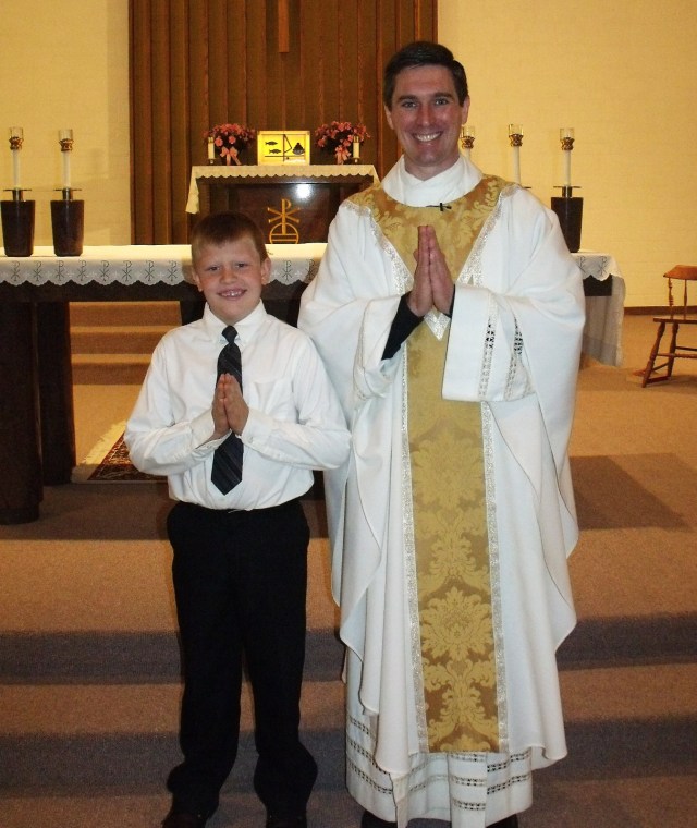 Mario Callens and Father Craig Timmerman at St. Leo Catholic Church for First Holy Communion!
