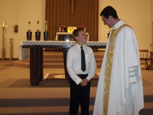 Mario and Father Craig Timmerman who is always a teaching and preaching, good example to everyone around.  He's a patient, loving and Good Shepherd!!