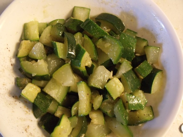 Zucchini!  Steam or lightly fry in olive oil until just barely cooked.  Toss with garlic powder or fresh, salt, pepper and olive oil.  Server very hot......top with parmesan cheese if you like.