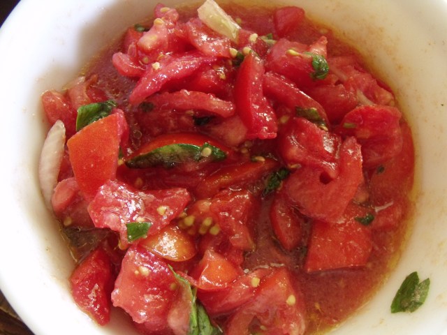 Tomatoe salad.  Simply, cut tomatoes and sweet onions. Add salt, pepper, olive oil, sweet italian basil and a ton of garlic, fresh or powder.  Eat plain or with crusty dipping bread.  