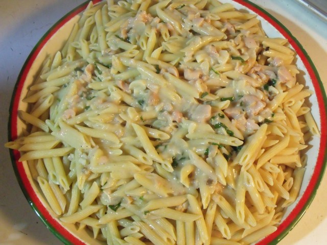 Pasta and Clams.  Very simply, melt butter and a bunch of slivered garlic.  Add two cans of clams, salt, pepper, sweet italian basil and cream.  Thicken the cream with a tab. of cornstarch.  Pour over aldente pasta of your choice.  