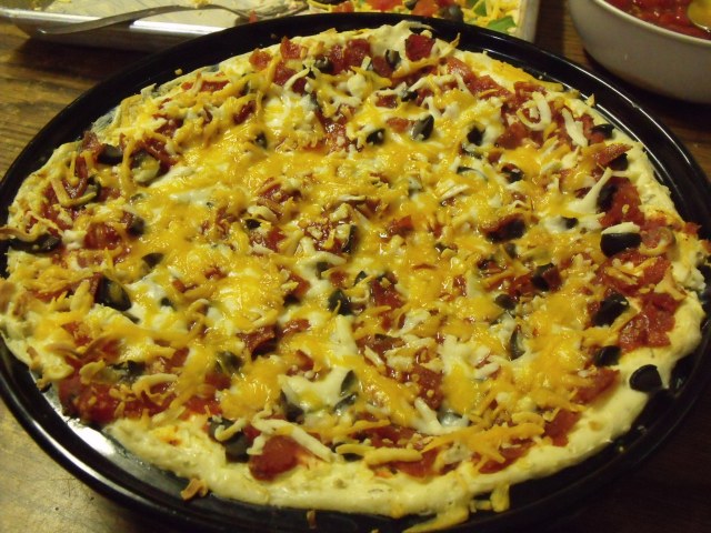 This is a delicious Hot Pepperoni Pizza Dip. This was made by Maggie and Frenchy for a pre-Lent gathering.