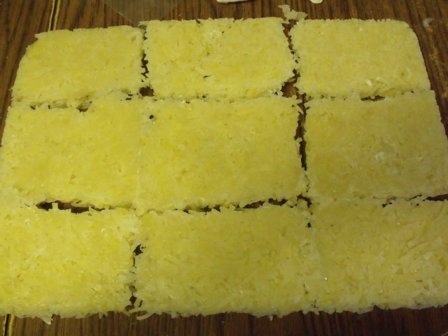 Pre cooked frozen blocks of hash browns made from potatoes that were sprouting. Fry up and serve.