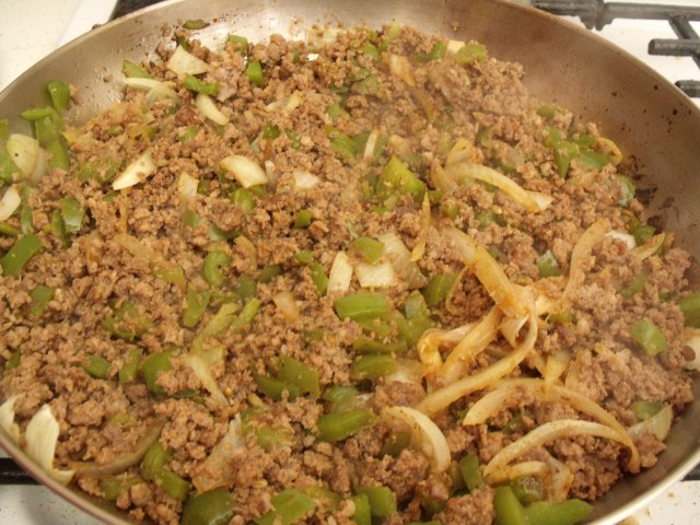 Sausage, peppers, onions, garlic, tomato, salt and pepper. Serve with Calebs bread.