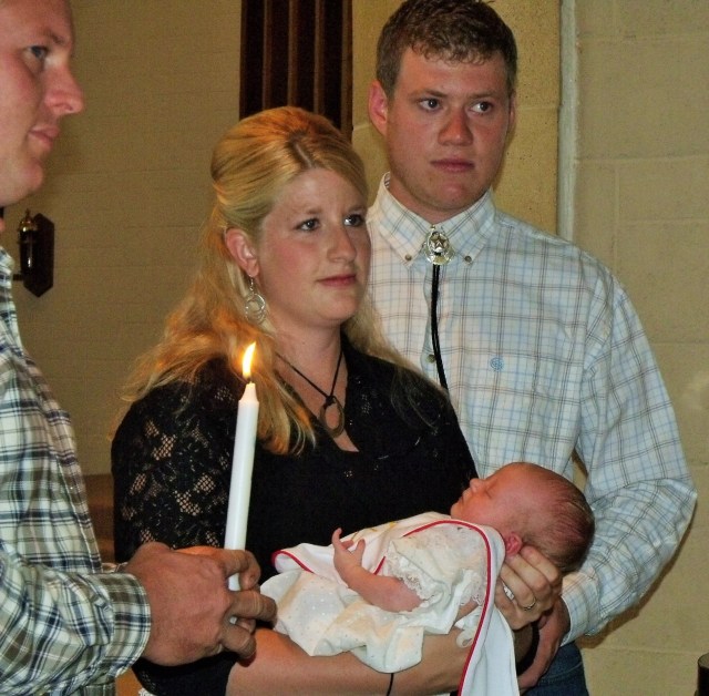 Baptism at St. Leo with Andrew, Frenchy, Peter and Josie.