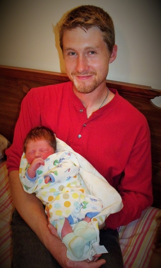 Luke with his newborn baby boy.  Life doesn't get much better than this !
