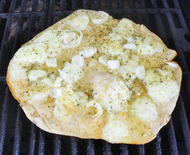 Focaccia...white pizza grilled with our own cheese! Oh Boy........