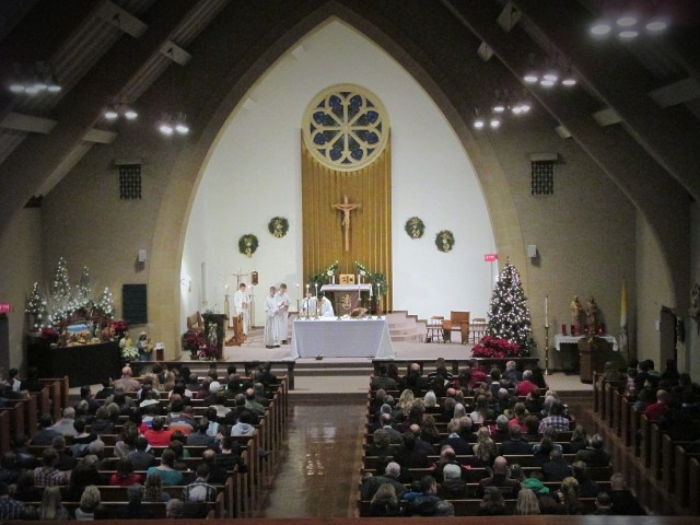 Full beautiful Mass at St. Leo's 4:00 P.M. mass.  Caleb was happy to serve!