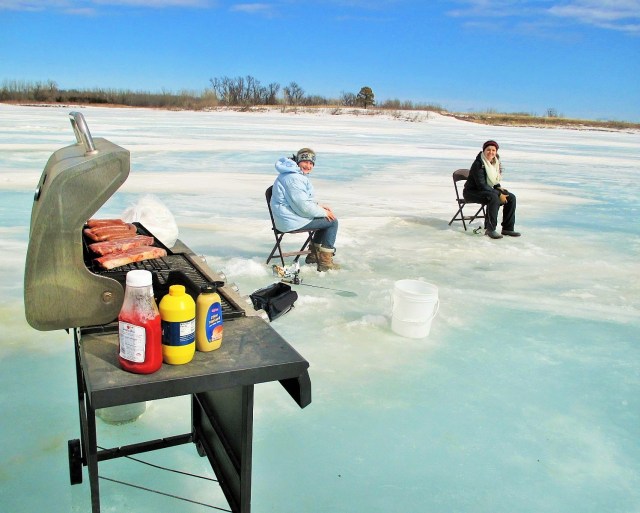 Home-made hotdogs, home grown chops. My first time grilling on ice........wow this is fun.