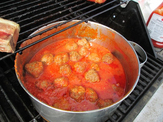 Meatballs with plenty of hot sauce to warm up a body on ice!