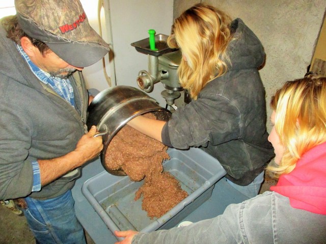 Fred, Marisa and Silvana getting the sausage ready for the stuffing process.