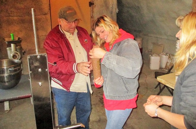 Alan gives Silvana her first sausage stuffing lesson on our new stuffer. He used to own a butcher shop out in Wyoming!
