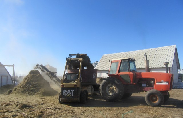 Great weather for grinding up feed for the livestock. From dreary muddy days to blue skies.