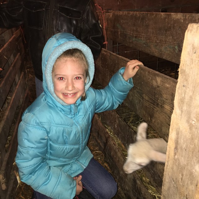 Kallie with an Easter lamb.
